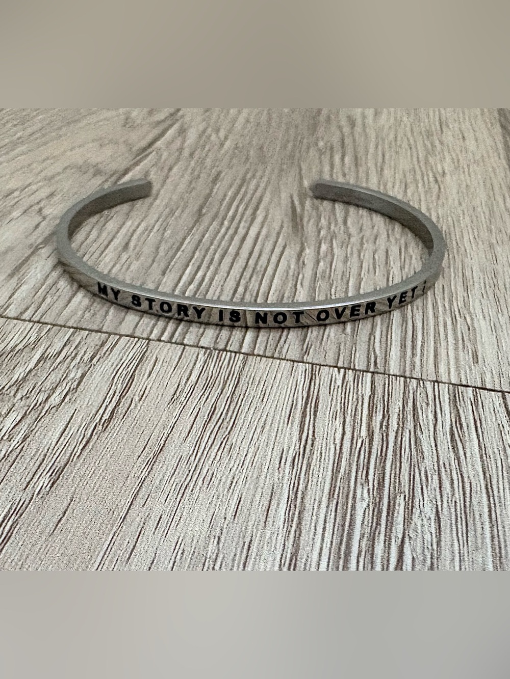 Mantraband Silver Bracelet
“My Story Isn’t Over Yet;” 🖤